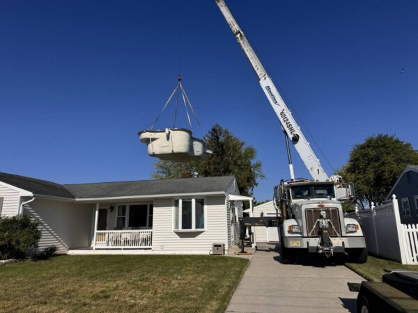 Manitex 40124SHL boom truck on a specialty lift