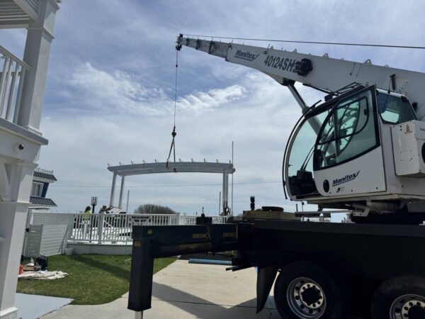 Manitex 40124SHL boom truck on a specialty lift